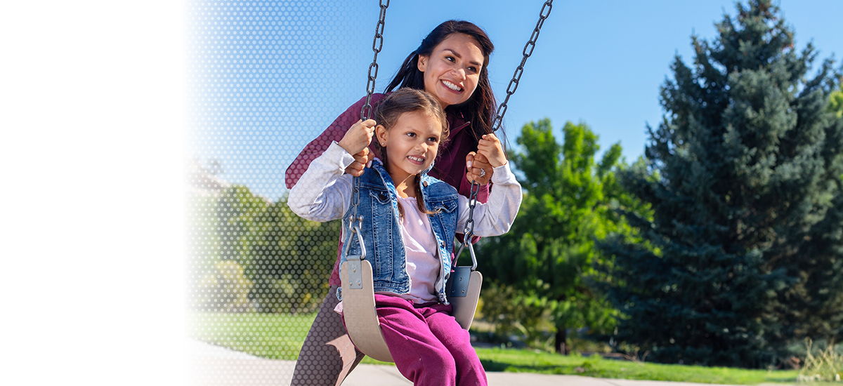 Promotional Image of a woman solving a puzzle with a child