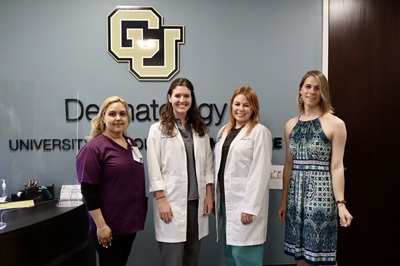 CU Medicine Dermatology team with electrolysis patient CU Medicine Dermatology team with electrolysis patient
